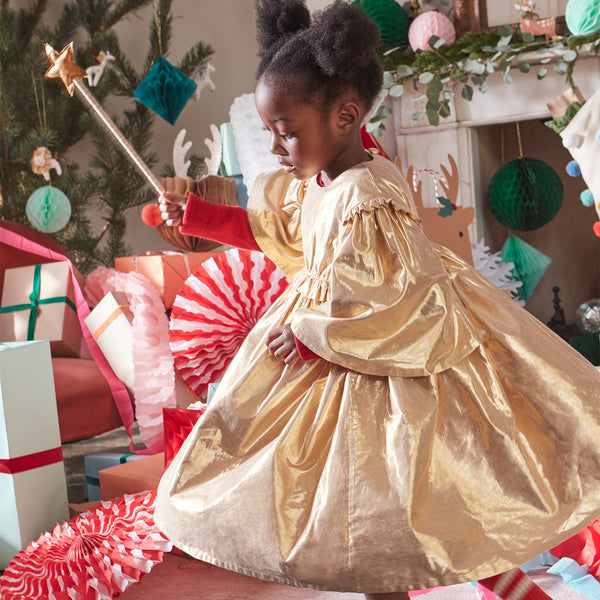 This beautiful gold lamé Christmas dress for girls is really angelic