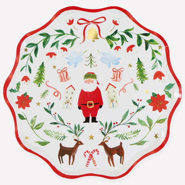 Our Christmas dinner plates, made from heavyweight paper, feature a painterly folk-inspired scene of Santa that's perfect for guests of all ages. Image1