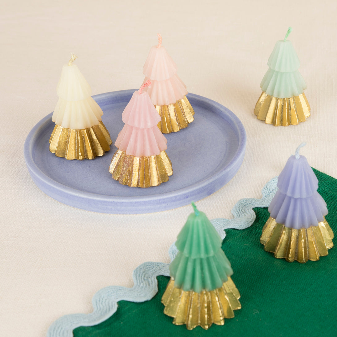 Our Christmas tree candles come in 6 delightful colours with shiny gold ink bases, they make wonderful Christmas host gifts.