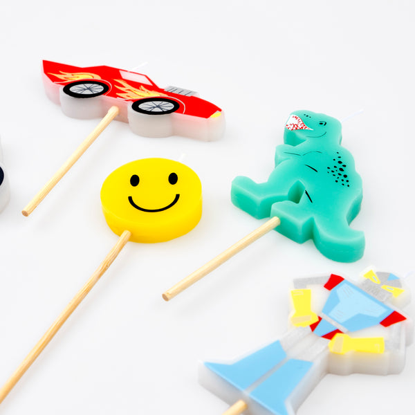 Make your birthday cake look amazing with our candles featuring classic toybox designs including a dinosaur candle and a car candle. Image3