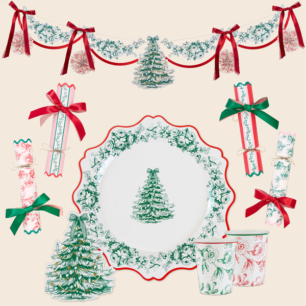 Our Christmas tableware set has an elegant Toile de Jouy print on plates, cups, napkins, crackers and a beautiful paper garland. Image1