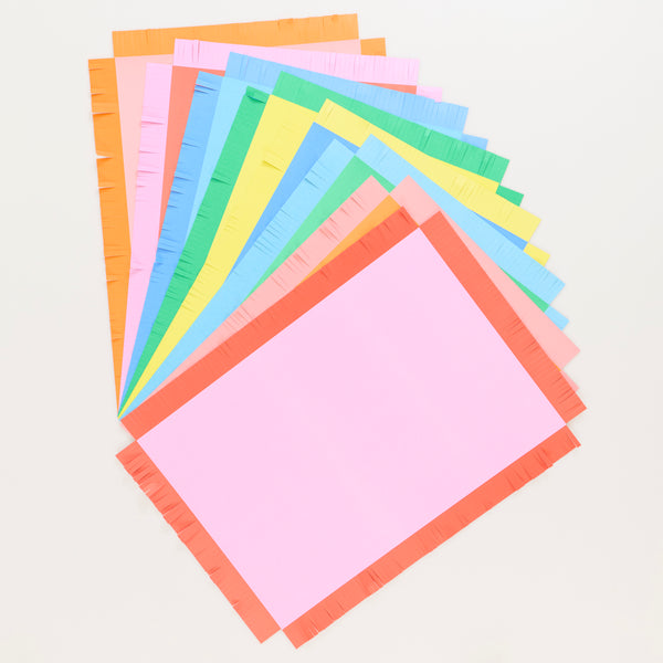 Our bright placemats, made from paper, feature a fun fringed effect to add a playful touch to your birthday party supplies. Image1