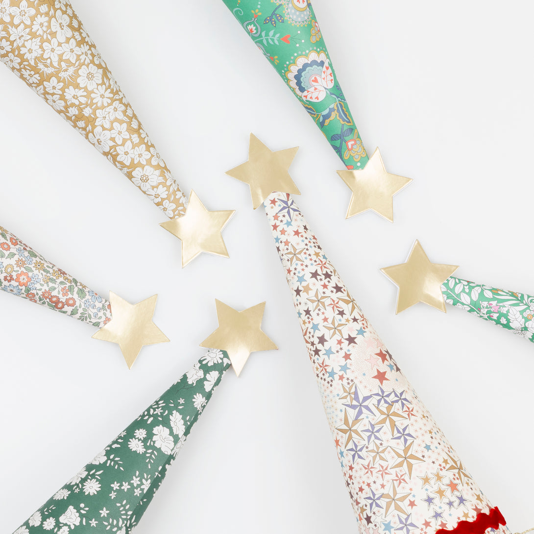 Our Christmas crackers feature stunning Liberty floral prints, velvet ric rac, matt gold tone details, and contain a party hat, joke and quality gift. Image6