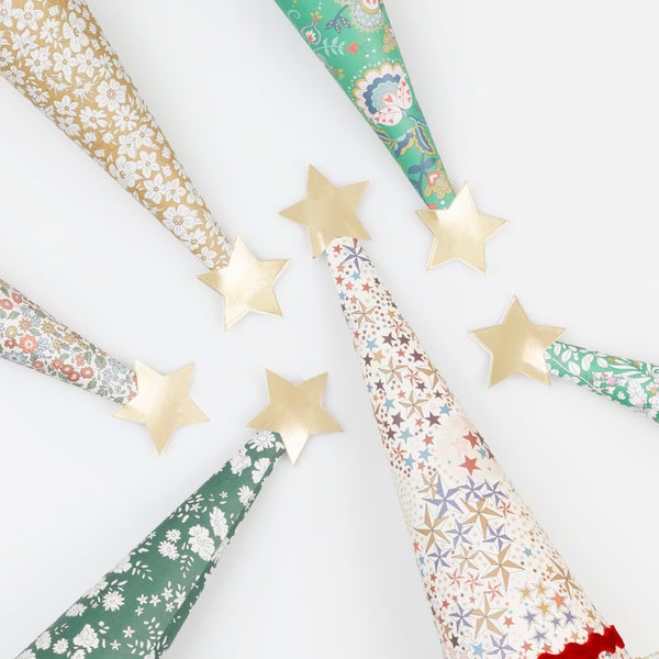 Our Christmas crackers feature stunning Liberty floral prints, velvet ric rac, matt gold tone details, and contain a party hat, joke and quality gift. Image6