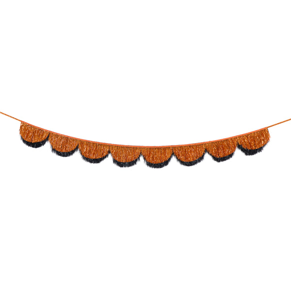 Our Halloween garland features 2 foil tinsel fringe layers in classic orange and black, with scalloped shapes, that catch the light beautifully. Image4