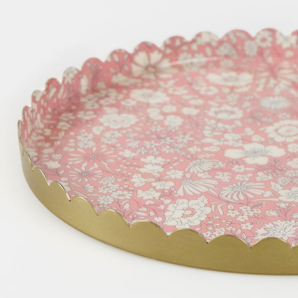Our accessory tray, made from enamelled metal with a delightful pink and white Liberty design, makes a beautiful hostess gift. Image3