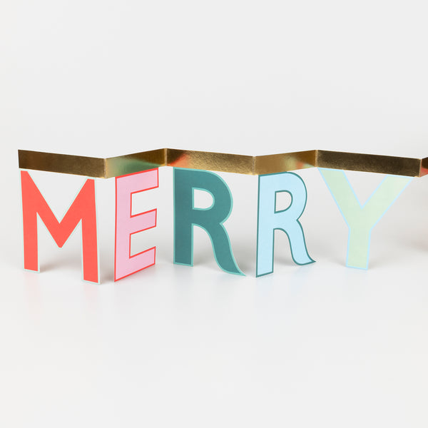 Send festive joy with our cheerful concertina card, it opens to reveal a Merry Christmas message, ideal as a mantel decoration. Image2