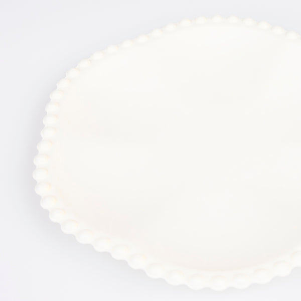 Our compostable dinner plates have a natural colour and stylish dot edge that will look great at a bridal shower or baby shower. Image3