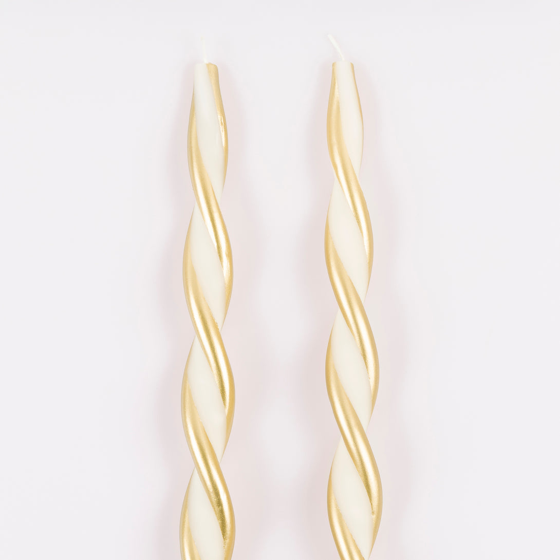 Use our ivory and gold candles, with a stunning twisted design, to add elegance to your Christmas decor. Image4