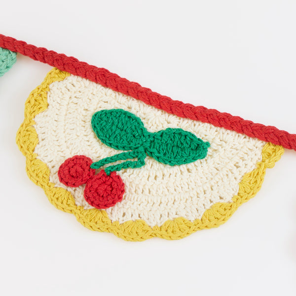 Our crochet garland features scalloped pennants with colourful designs, presented in an organza drawstring bag, a beautiful decoration. Image4