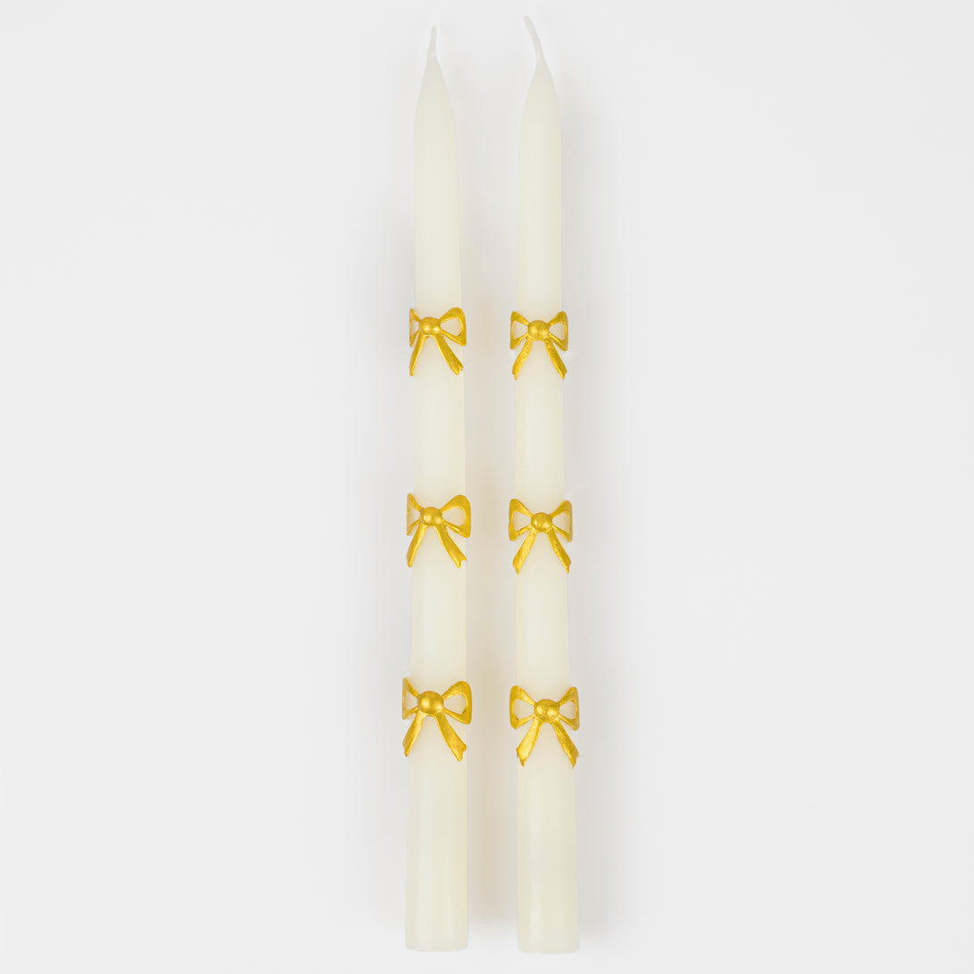 Our taper candles, with a bow design, are perfect as Christmas decorative candles.