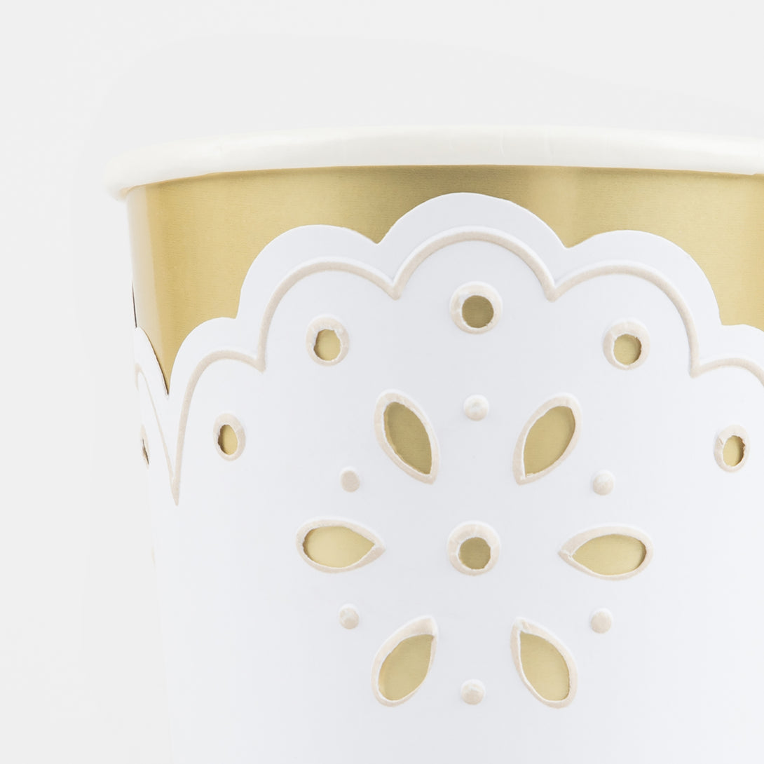 Our white party cups have an embossed lace design and shiny gold foil details, ideal as special celebration cups.