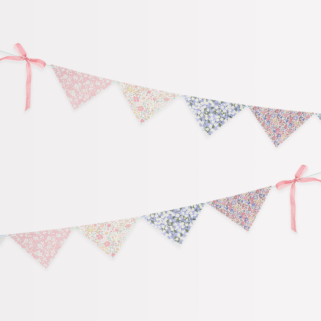 Use our party garland, with floral Liberty print designs and velvet embellishments, as part of your baby shower decorations.