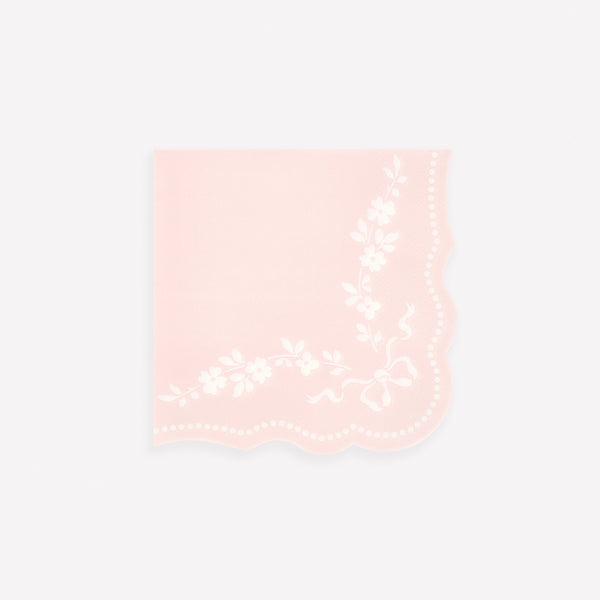 Our small paper napkins, are pastel pink with a white ornamental design and sculptured edges, perfect for bridal showers or baby showers. Image1