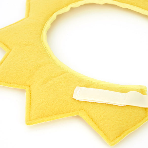 Our sun headdress is crafted from a glitter fabric and felt, with a padded filling for a fabulous 3D effect. Image3