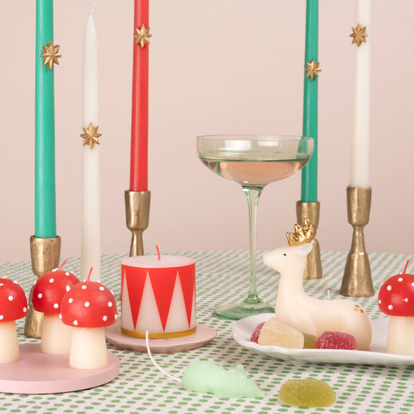 Our Christmas tall candles features gold wax stars and coloured wicks for a sensational effect, a great host gift. Image2