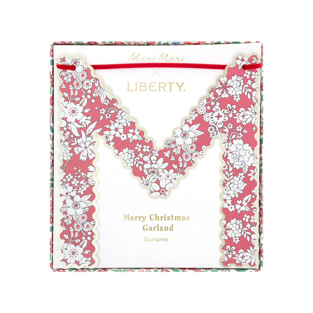 Our paper Merry Christmas garland features joyful festive Liberty prints and red velvet ribbons for an elegance and style. Image3