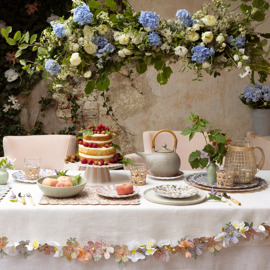 Our floral garland features pretty Liberty prints, making it wonderful for home decoration or as a baby shower decoration.