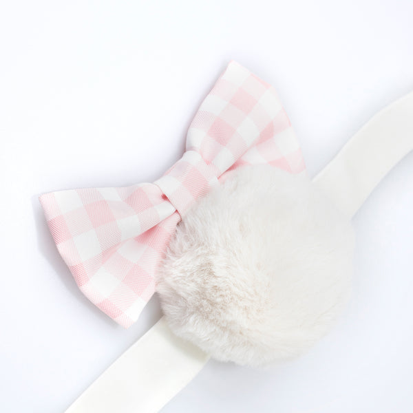 Our Easter costume, a set of bunny ears and tail, is made from plush fabric and presented in a gingham bag. Image4