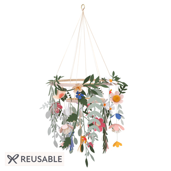 Our beautiful paper chandelier is crafted from paper flowers and leaves and wooden hoops. Image1