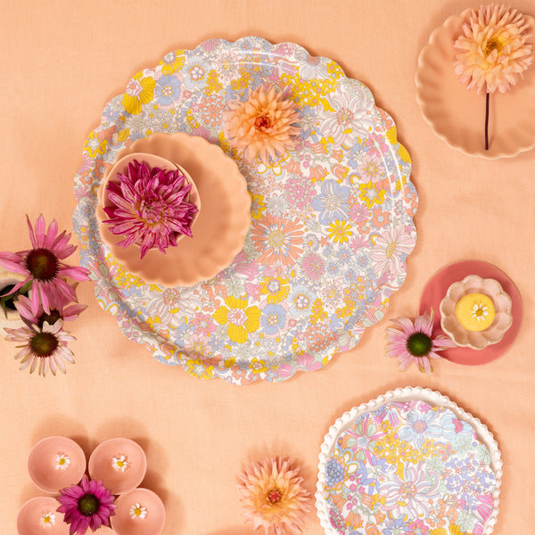 Our round tray has a floral Liberty print design, and is made from birch veneer plywood with a melamine coating, for practicality and style. Image2