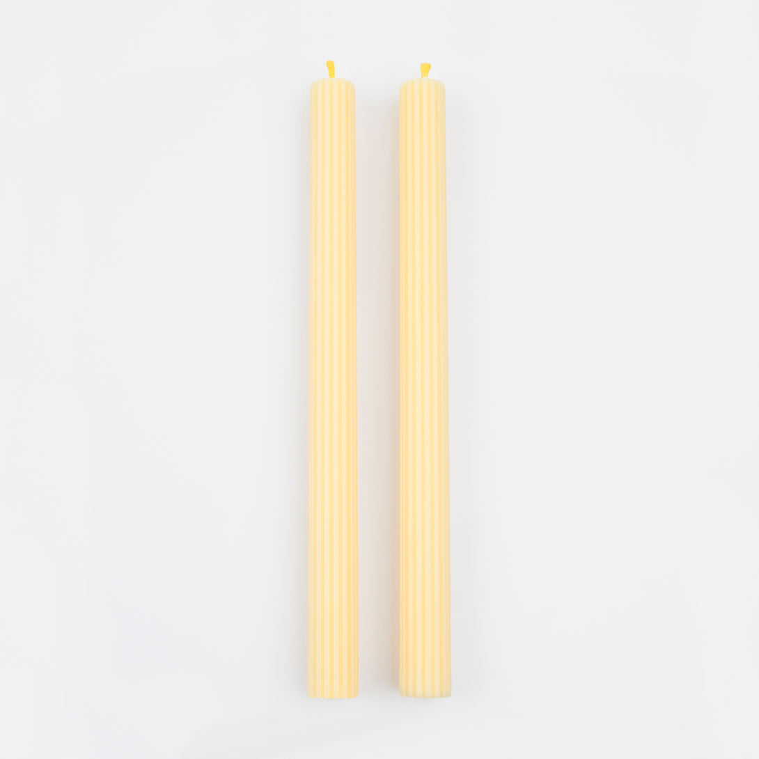 Our long candles, in a cheery yellow, look amazing on the mantel or table.