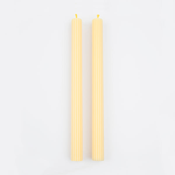 Our long candles, in a cheery yellow, look amazing on the mantel or table.