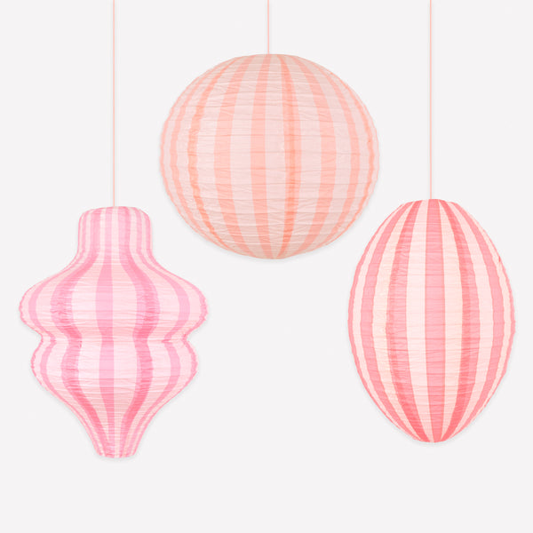 Our striped pink paper lanterns are the perfect hanging decorations for baby showers, birthday parties or all year decorations. Image1