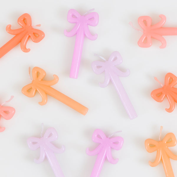 Our mini birthday candles, in a stylish bow shape in five shades of pink and peach, are ideal to add decoration to birthday or bridal shower. Image3