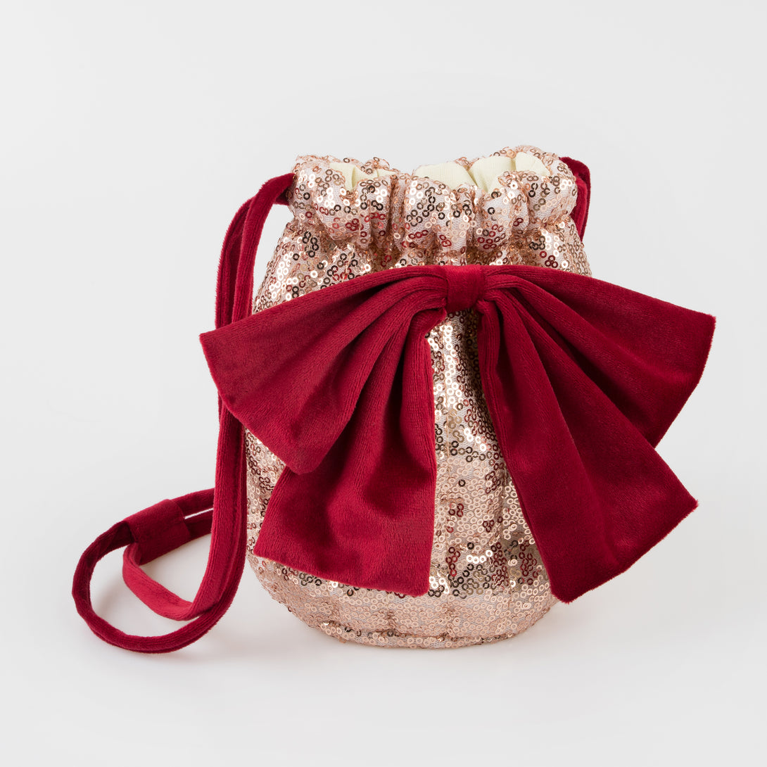 Our Christmas bag is the perfect accessory for Christmas dress up, with pink sequinned tulled and a big red velvet bow.