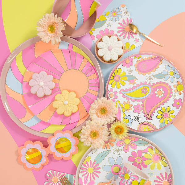 Our side plates, made from paper, feature vibrant flower power designs in psychedelic colours, ideal for 70s parties and cocktail parties. Image2