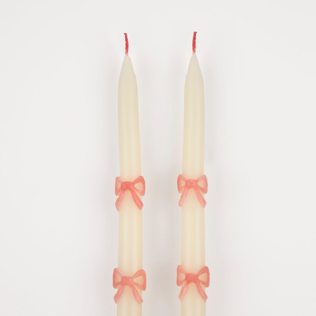 Our party candles feature handpainted pink bows and pretty pink wicks. Image3