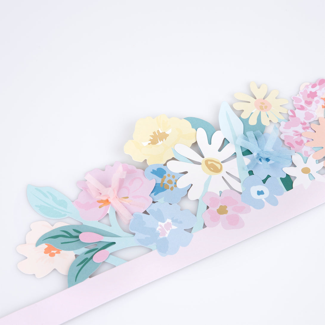 Our headdress, made with paper flowers, is the perfect Easter accessory.