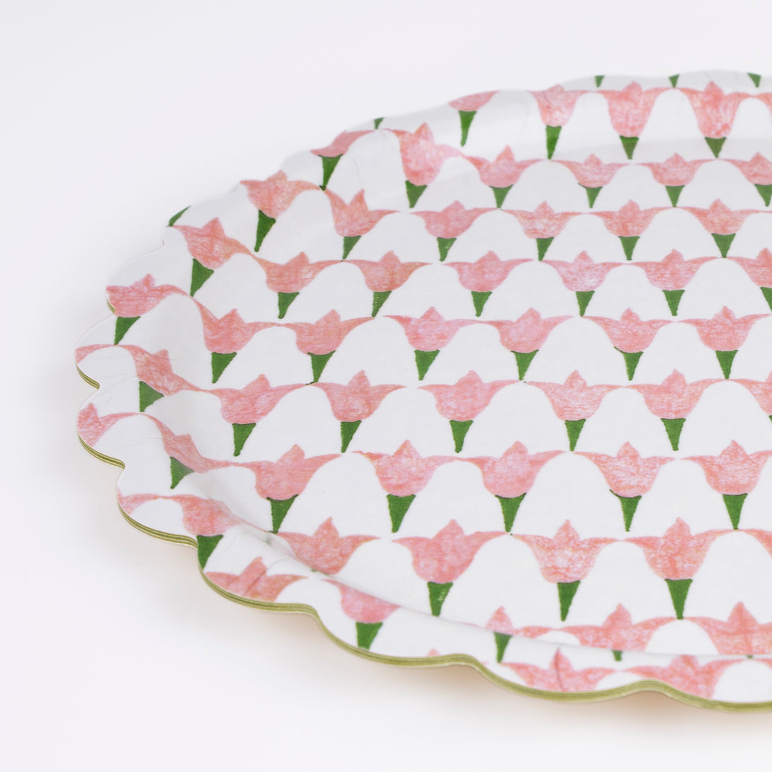 Our small wooden tray, made with birchwood veneer and a melamine coating, has a pretty Molly Mahon floral print.