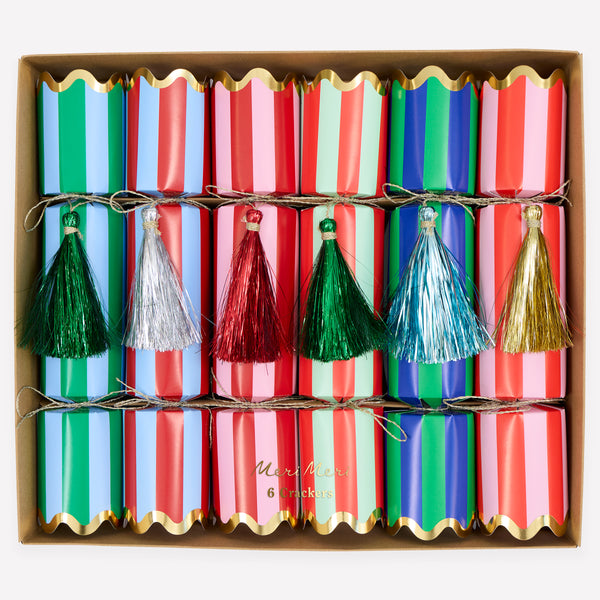 Our Christmas party crackers, with fun stripes and tinsel tassel details, contain a gold party hat, joke and a small gift to delight your guests. Image1