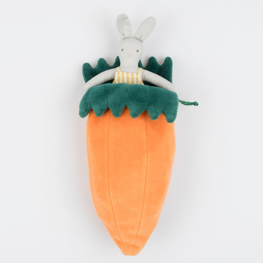 Our mini fabric bunny toy lives in a velvet carrot pouch for lots of imaginative fun.