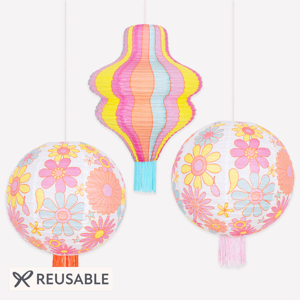 Our paper lanterns set, with 2 round laterns and 1 wavy lantern, feature vibrant flower designs, ideal for a groovy look. Image1