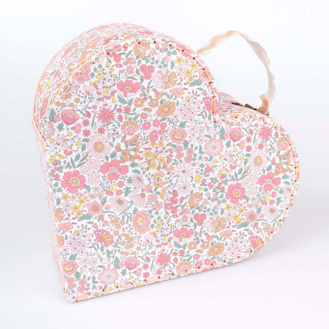 Our mini suitcases feature pretty Liberty floral prints in pink tones, fabulous for kids aged 3+ and adults, for travel and storage.