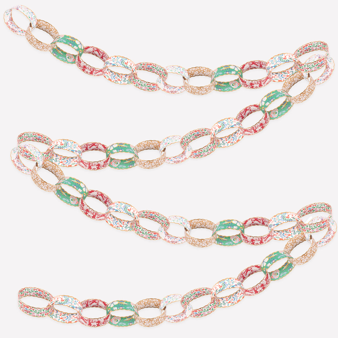 Use our paper chain garland, with Liberty prints in festive colours, as the ideal Christmas hanging decorations. Image1