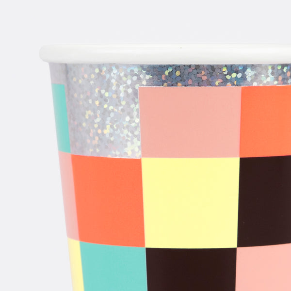Our party cups, with holographic foil and a brighten checkerboard design, are perfect for hot or cold drinks for kids who love retro games. Image3