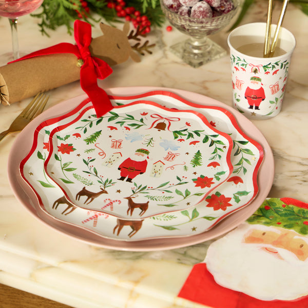 Our Christmas cups, made from paper, feature Santa in a folk-inspired setting with a painterly design, perfect to add a special touch to meals. Image2