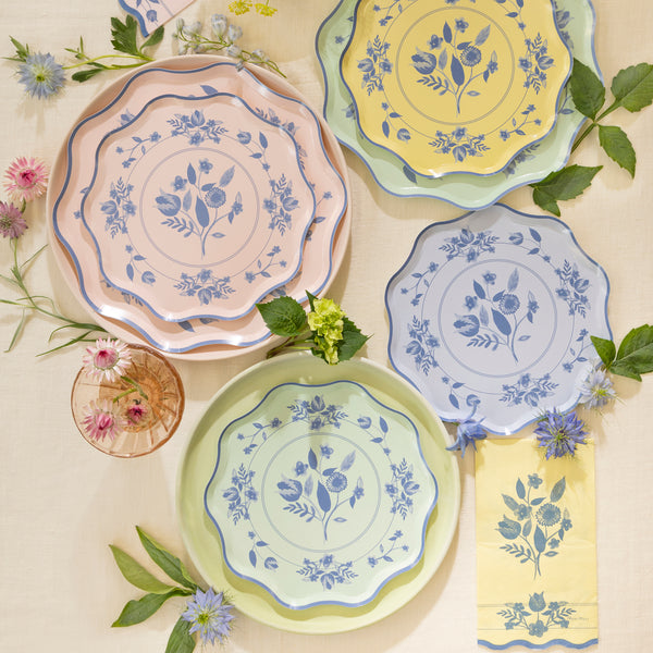 Our paper plates feature four pastel shades with cobalt blue botanical illustrations, ideal as bridal shower plates or for any grown up dinner. Image2