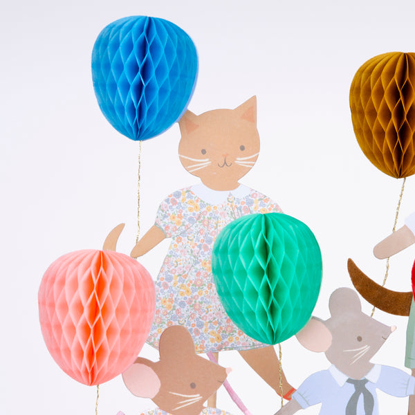 Our cake toppers feature animals with honeycomb balloons  and fun embellishments, to make your baby shower or birthday party look great. Image2