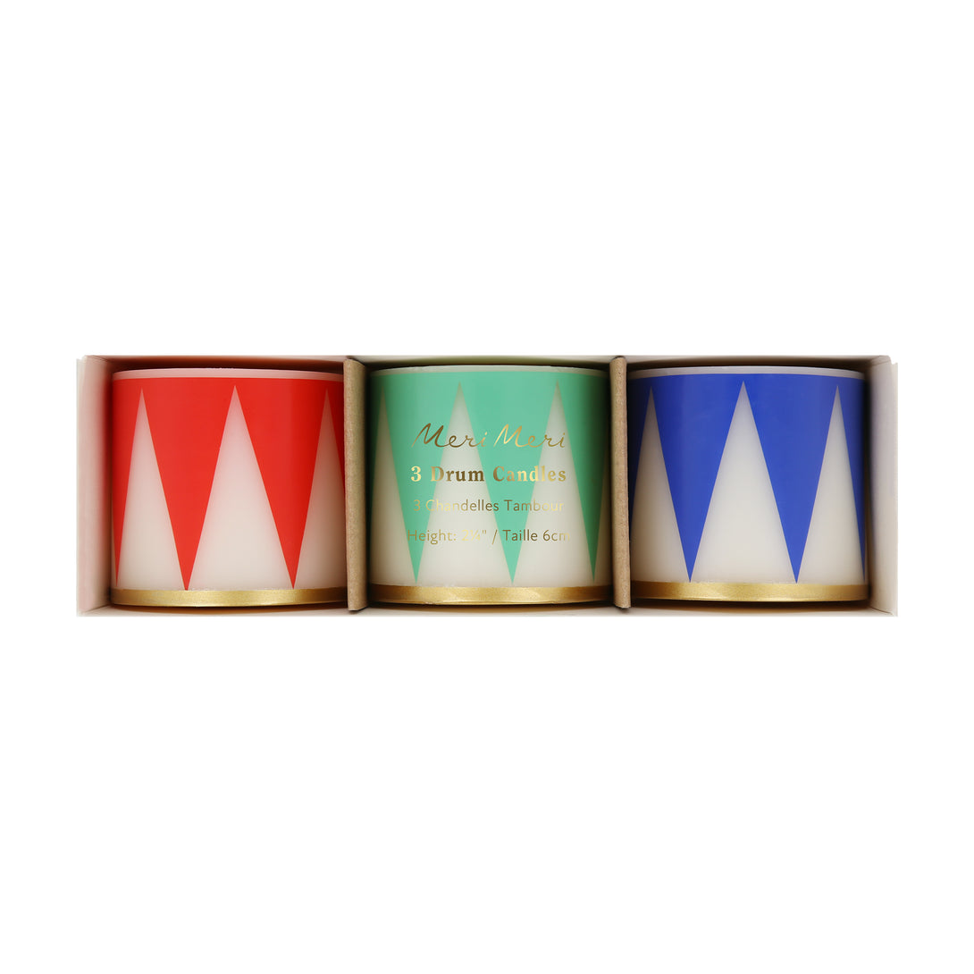 Our Christmas candle set of 3 candles have traditional Nutcracker designs of red, green and blue, with gold details and red wicks.