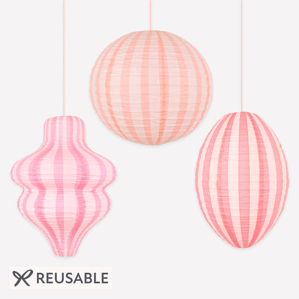 Our striped pink paper lanterns are the perfect hanging decorations for baby showers, birthday parties or all year decorations. Image1