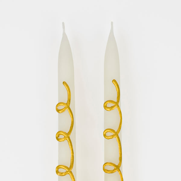 Our taper candles, with a gold swirl design, are perfect as Christmas decorative candles. Image4