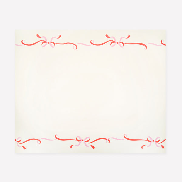 Use our Christmas table runner, made with high-quality paper with a pink and red ribbon bow design, for an instantly elegant effect. Image1
