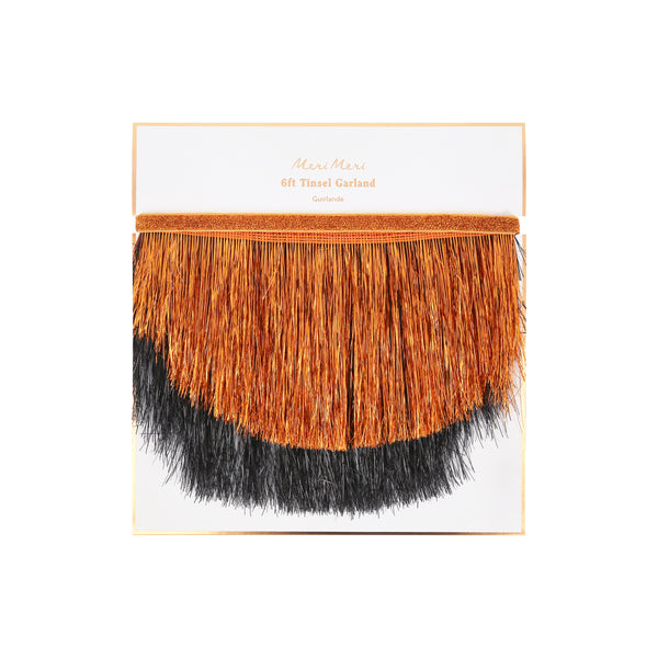 Our Halloween garland features 2 foil tinsel fringe layers in classic orange and black, with scalloped shapes, that catch the light beautifully. Image5
