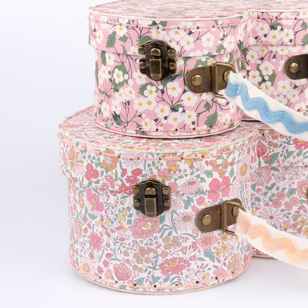 Our mini suitcases feature pretty Liberty floral prints in pink tones, fabulous for kids aged 3+ and adults, for travel and storage. Image4