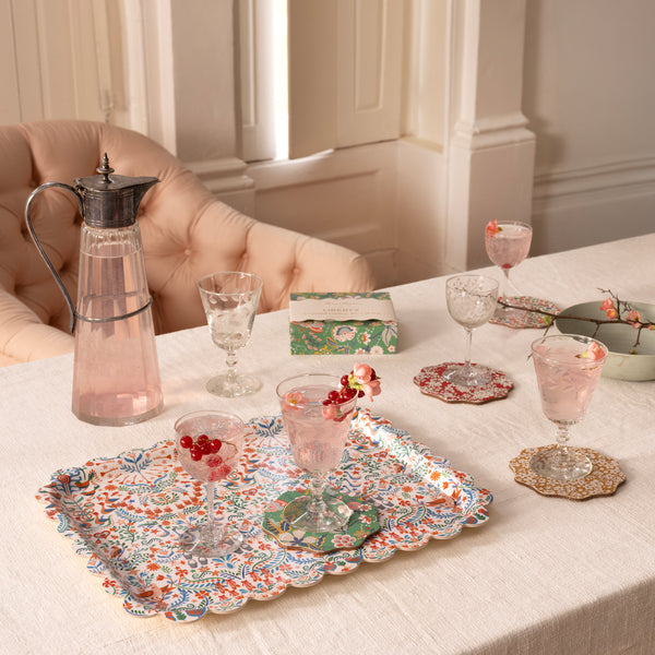 Our small tray, made from wood, has a Liberty Christmas design with a stylish scalloped edge. Image2